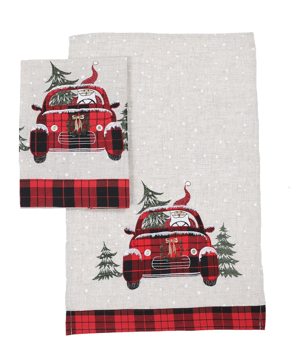 Santa Claus riding on a plaid car with a snowy background, featured on decorative towels for Christmas.